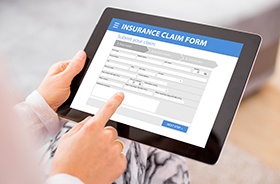 Insurance claim form displayed on tablet