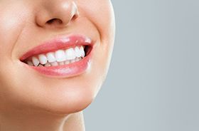 Close-up of woman’s bright, beautiful teeth